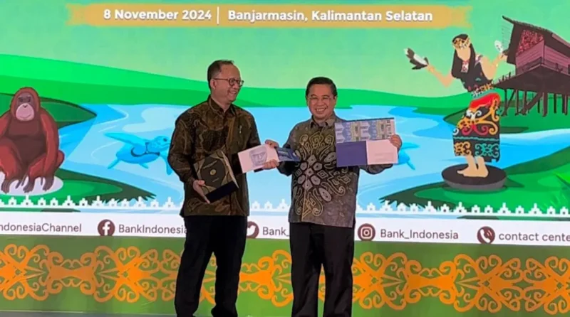 Direktur Departemen Pengelolaan Uang Bank Indonesia, Budi Sudaryono dan Wali Kota Ibnu Sina pada pembukaan RUPAWAN 2024 (foto:istimewa)