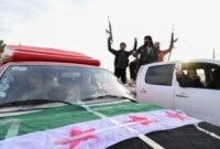 Pasukan pemberontak Suriah di Umayyad Square, Damaskus, setelah deklarasi kejatuhan rezim Presiden Bashar Al Assad. (Foto: AFP/LOUAI BESHARA/bomindonesia)