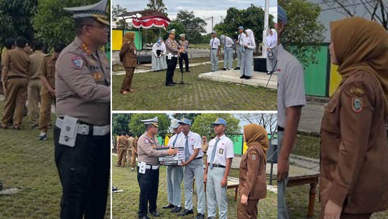 Direktur Lalu Lintas Polda Kalsel Kombes Pol Dr Fahri Siregar saat memberikan pemahaman kesadaran berlalu lintas kepada siswa siswi SMA Banua Kalsel usai jadi inspektur upacara sekaligus membagikan helm berstandar SNI dan perlengkapan lainnya (Foto Istimewa)