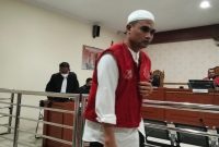 Tubagus Fathul Azim alias Martin YZ alias Xcsoot alias Feelgood usai mendengarkan dakwaan jaksa di PN Banjarmasin (Foto Istimewa)