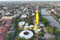 Tugu 0 Kilometer Terletak di Jalan Jenderal Sudirrman, Kota Banjarmasin, Provinsi Kalimantan Selatan