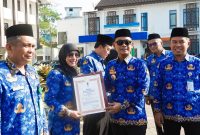 Wali Kota Banjarmasin H. Muhammad Yamin HR membacakan sambutan Ketua Umum Dewan Pengurus KORPRI Nasional, Prof. Dr. Zudan Arif Fakrulloh, SH, MH.