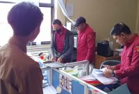 Tim dari Kejati Kalsel saat melakukan penggeledahan (Foto Istimewa)