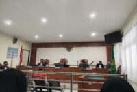 Terdakwa Andre Saputra saat menjalani sidang perdana pembacaan dakwaan di Pengadilan Negeri Banjarmasin. (Foto: Mercy)
