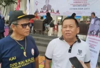 Dr HA Murjani SH MH (Berbaju Putih)