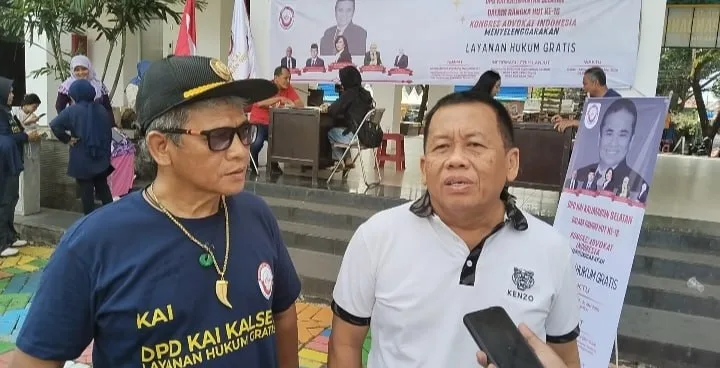 Dr HA Murjani SH MH (Berbaju Putih)