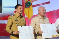Gubernur Kalsel Haji Muhidin dan Bupati Tanbu Andi Rudi Latif (foto: adpim)